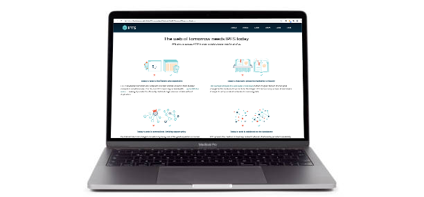Image of IPFS website displayed on a laptop