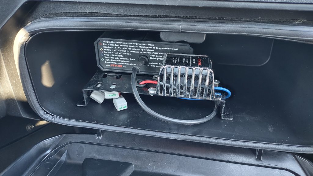 Tucked into the glove box