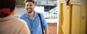 Healthcare worker speaks with patient.