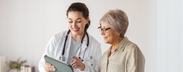 Healthcare worker and patient at appointment.
