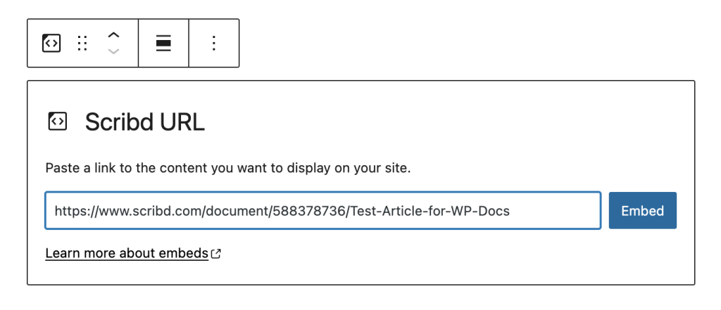Pasting a link into the Scribd block and clicking embed.