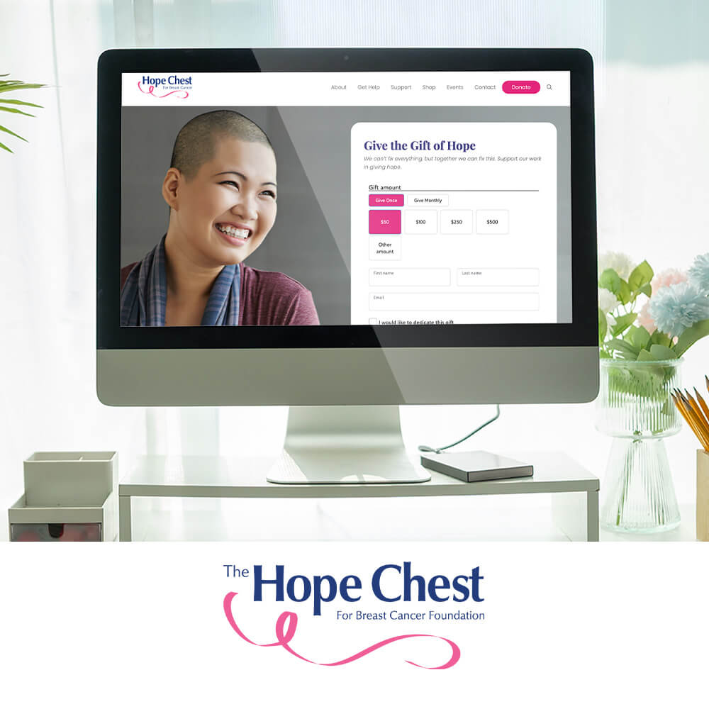 Hope Chest's redesigned website on monitor with logo underneath.