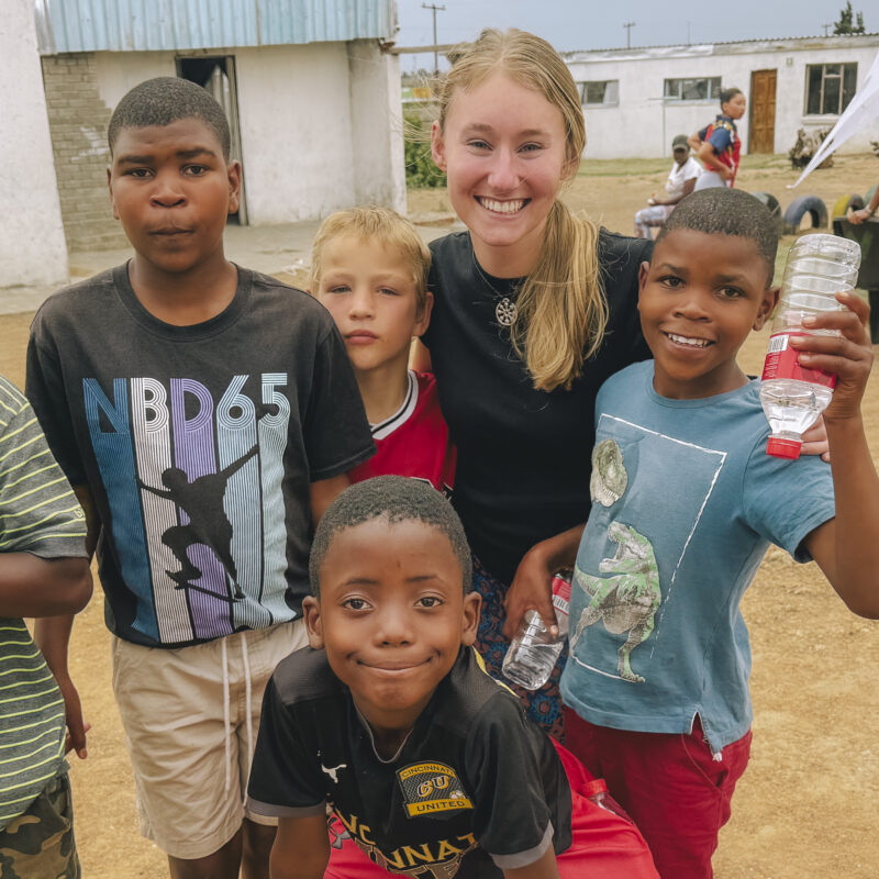 Addy with five kids in South Africa