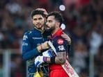 RCB's Virat Kohli with GT skipper Shubman Gill after hitting the winning runs. RCB's Virat Kohli with GT skipper Shubman Gill after hitting the winning runs.