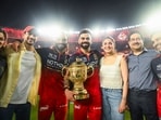 Royal Challengers Bengaluru's Virat Kohli, holding the trophy, poses for a picture with his wife, Anushka Sharma, and others after winning the Indian Premier League 2026 final Royal Challengers Bengaluru's Virat Kohli, holding the trophy, poses for a picture with his wife, Anushka Sharma, and others after winning the Indian Premier League 2026 final