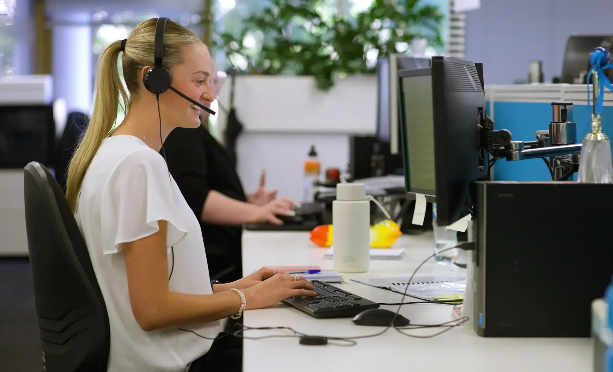 Charly, a dedicated MyBudget team member, welcoming Australians to discuss personal budgeting and debt solutions.