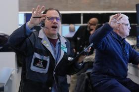 Financial_Markets_Wall_Street_18709 Anthony Spina, left, works with fellow options traders on the floor of the New York Stock Exchange, Wednesday, Jan. 28, 2026. (AP Photo/Richard Drew)