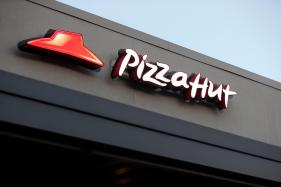 Pizza_Hut_35635 FILE – This Dec. 15, 2016, file photo shows a Pizza Hut restaurant in New Orleans. (AP Photo/Gerald Herbert, File)