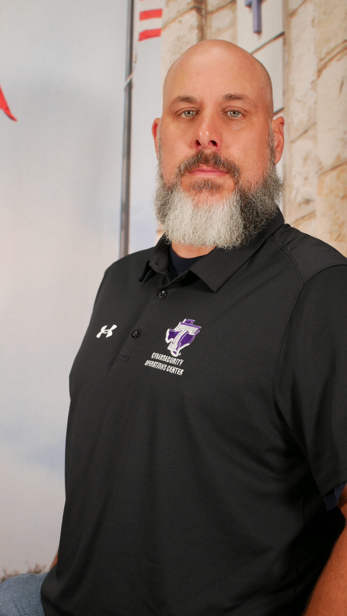 Man in a black polo with Tarleton State University logo.